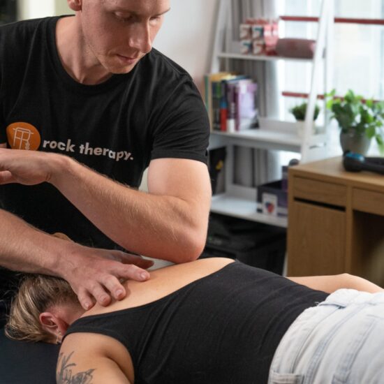 A man performing remedial massage